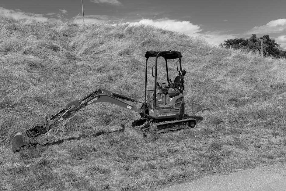 Travaux de excavator digging trench