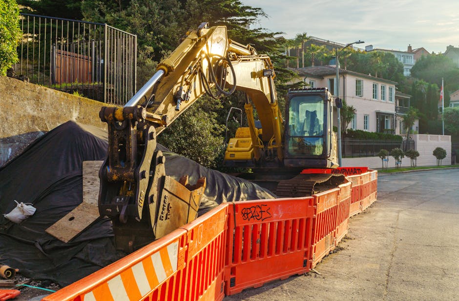 Travaux de excavator digging trench